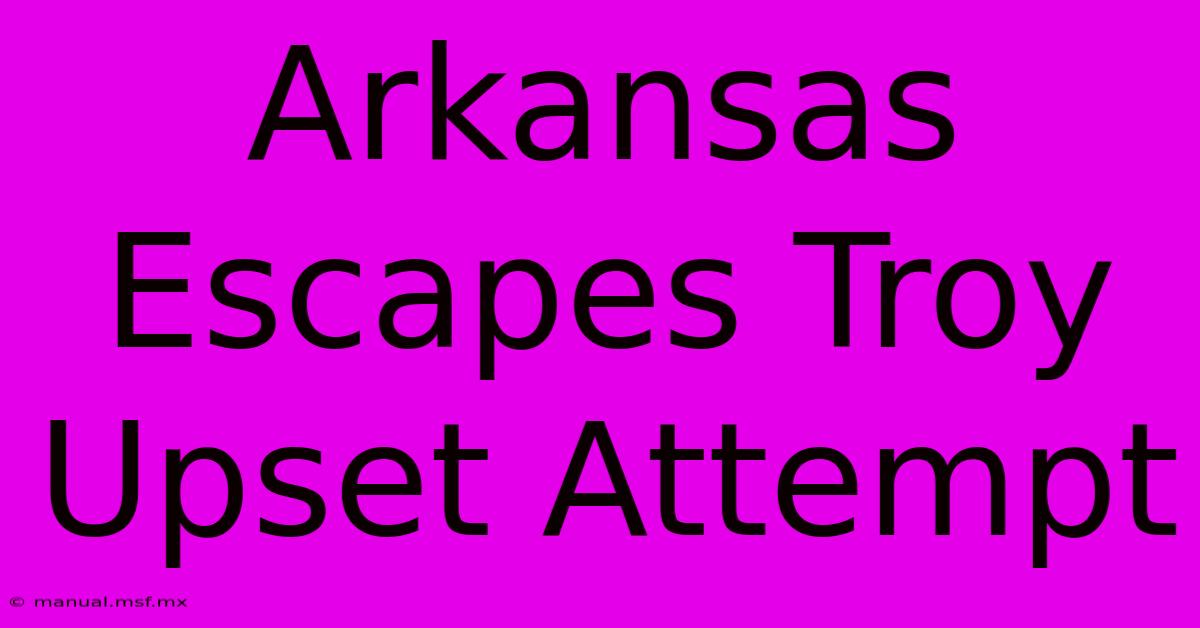 Arkansas Escapes Troy Upset Attempt